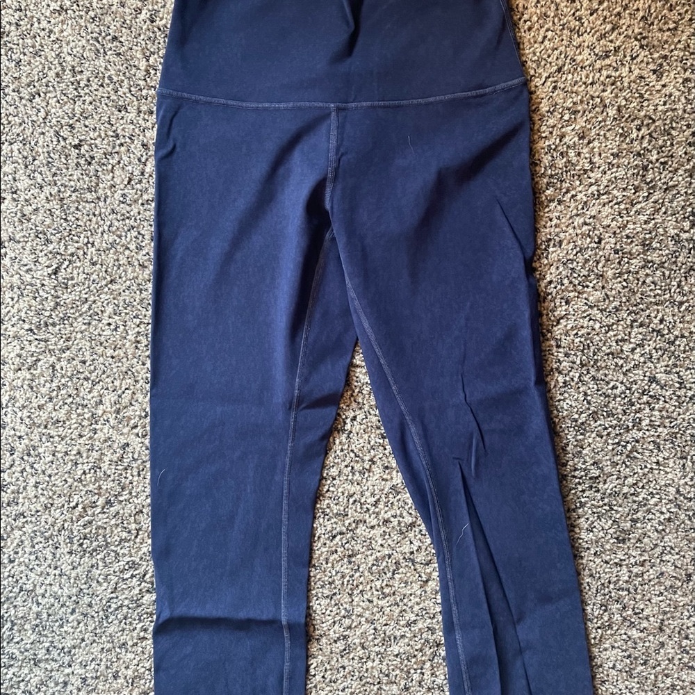 Lululemon wunder under high rise crop leggings.